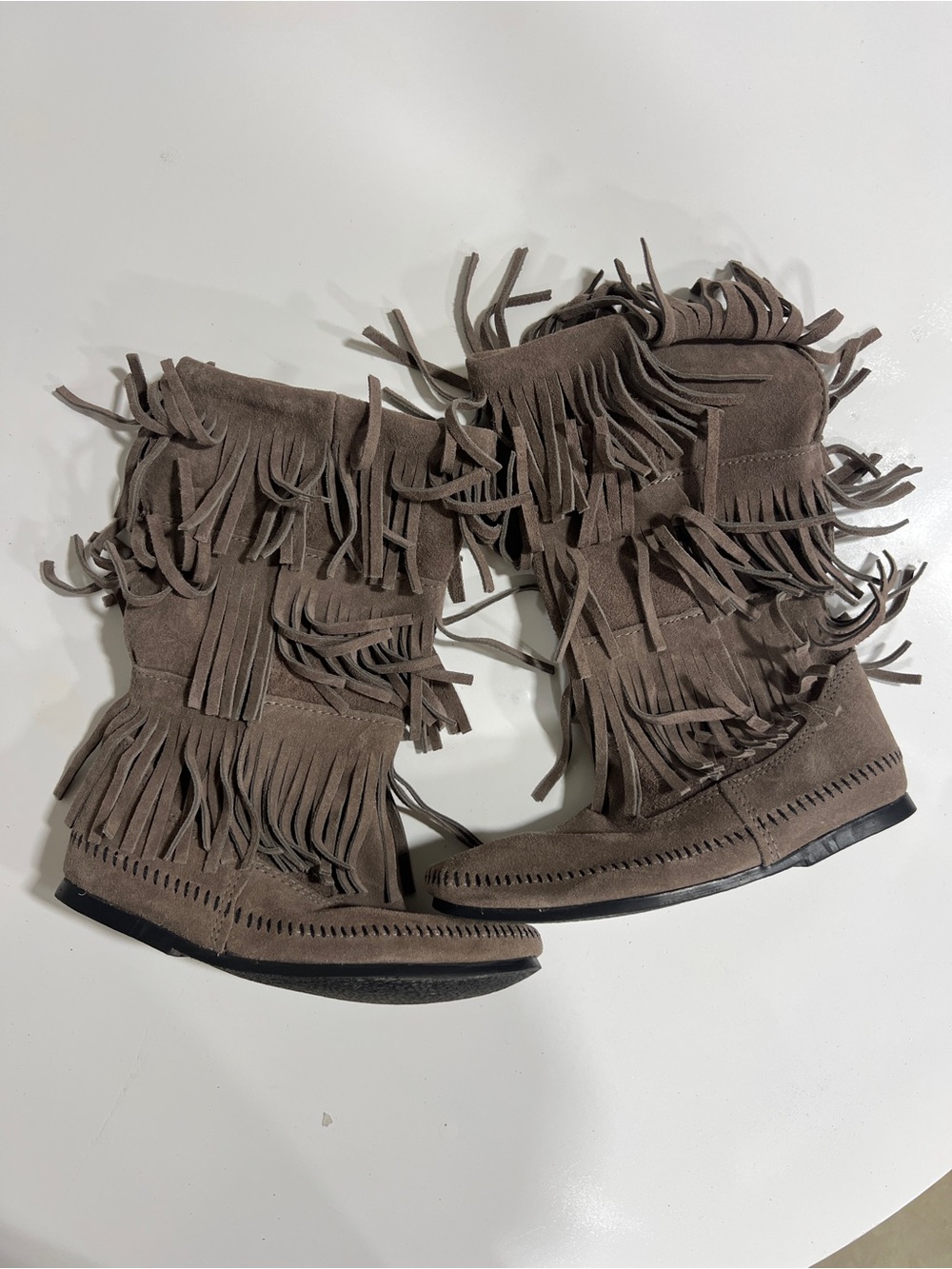 Minnetonka Taupe Suede Triple Fringe Moccasin Boots